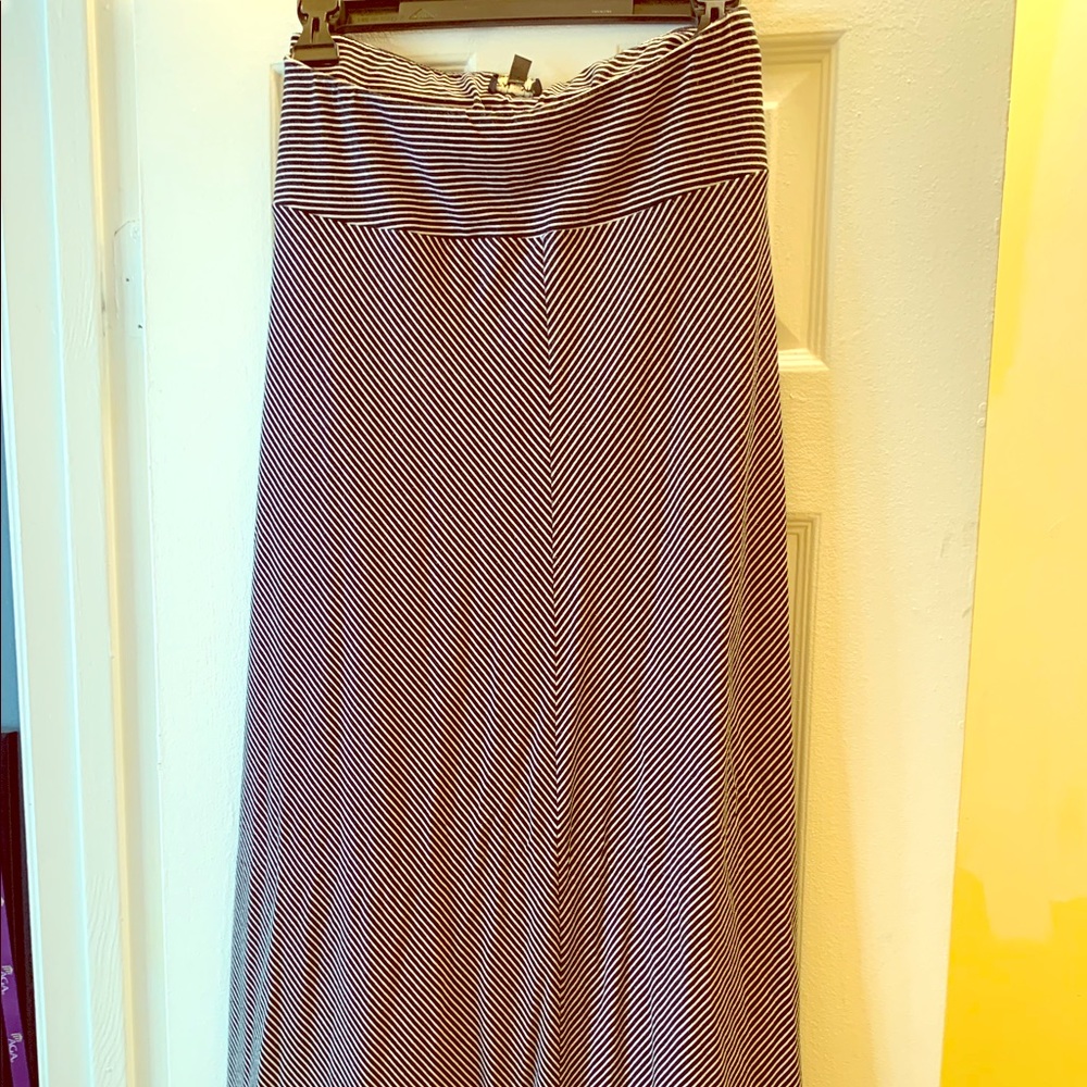 Long, flowing black and white skirt.